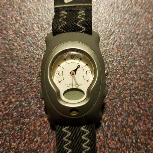 Horloge Nike, Sieraden, Tassen en Uiterlijk, Horloges | Heren, Zo goed als nieuw, Polshorloge, Overige merken, Staal, Overige materialen