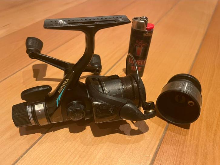 Shimano 1000GT Super X  met reserve spoel, Watersport en Boten, Hengelsport | Algemeen, Zo goed als nieuw, Molen, Ophalen of Verzenden