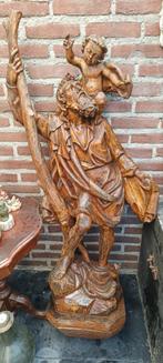 Groot hout religie beeld Sint Christoffel, Ophalen