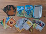 Pokemon bewaarblikje gevuld met 35 kaarten (3 glimmende), Ophalen of Verzenden, Zo goed als nieuw, Meerdere kaarten, Foil