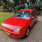 Toyota Starlet 1.3 16V 1998 Rood, Auto's, Toyota, Stof, 4 cilinders, Starlet, 400 kg