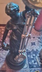 Vrouw beeld met klok  zwaar, Ophalen