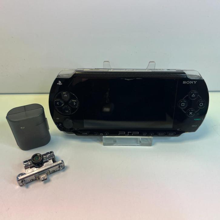 Sony PSP PSP1004 + Case + camera en lader, Spelcomputers en Games, Spelcomputers | Sony PSP, Zo goed als nieuw