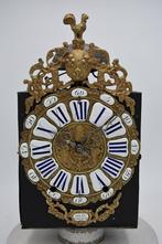 comtoise, cartouche, Ophalen