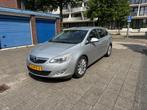 Opel Astra Sports Tourer 1.4 Turbo Cosmo, Voorwielaandrijving, Metallic lak, Gebruikt, Zwart