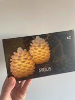 Sirius Clara Dennenappel 10 cm (2 st) LED kaars lampje NIEUW, Overige materialen, Wit, Nieuw, Ophalen of Verzenden