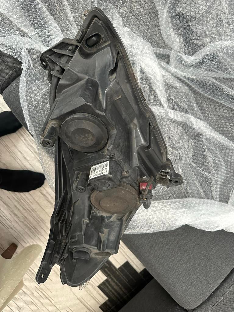 Opel Astra 2011 Koplamp Links, Auto-onderdelen, Verlichting, Ophalen of Verzenden, Gebruikt