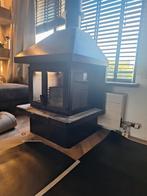 Zware, zwart geschilderde openhaard, Ophalen