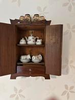 Houten Wandkastje, Ophalen