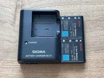 Sigma BC-31 Originele lader met Twee originele BP-31 accus beschikbaar voor biedingen