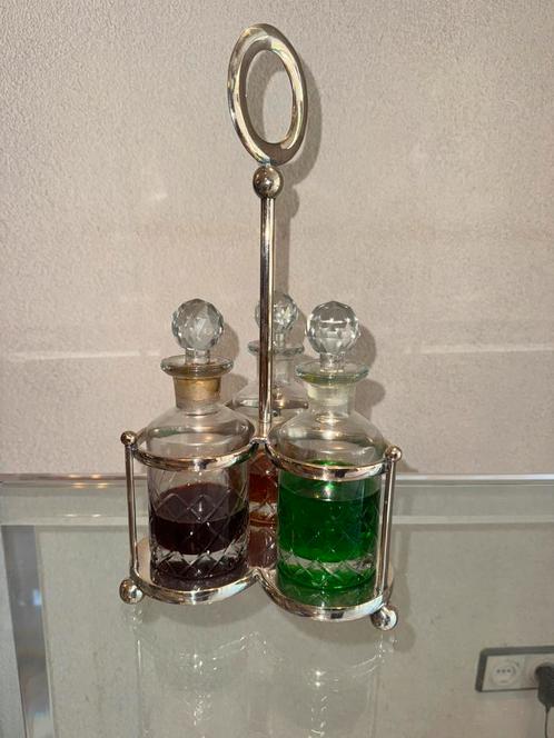 Kristallen olie- en azijnset in zilverkleurig rek, Antiek en Kunst, Antiek | Glas en Kristal, Ophalen of Verzenden