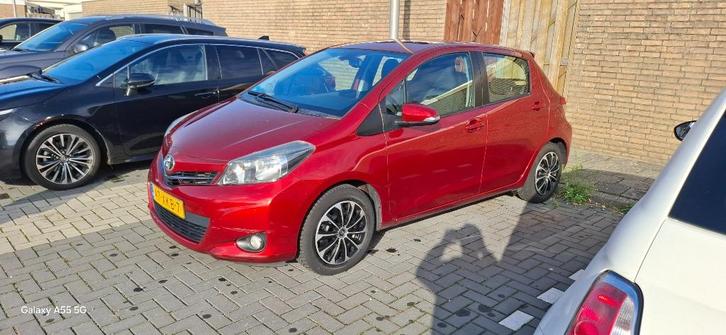 Toyota Yaris 1.3 16V Vvt-i 5DR 2012 Rood, Auto's, Toyota, Particulier, Yaris, ABS, Achteruitrijcamera, Adaptieve lichten, Airbags
