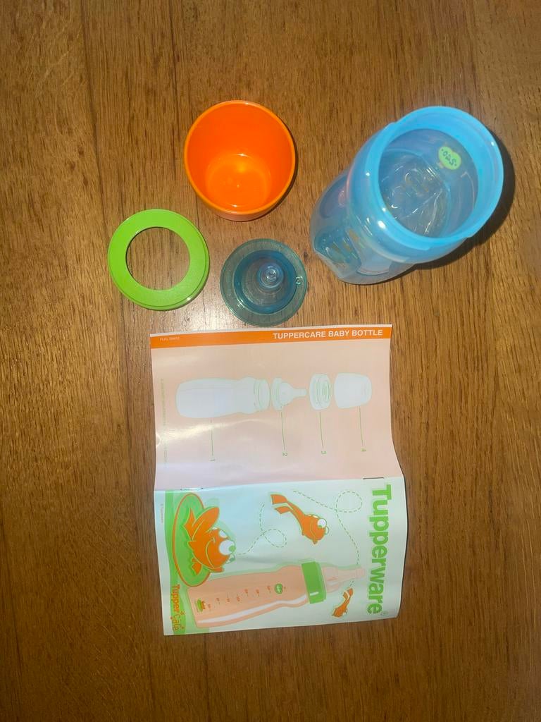 Nieuwe Tupperware baby fles met handleiding, Ophalen of Verzenden, Nieuw, Overige typen