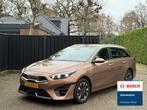 Kia Ceed Sportswagon 1.6 GDI PHEV DynamicPlusLine, Stof, Gebruikt, Bruin, Bluetooth