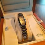 Delma Dameshorloge - Staal en Goud verguld, Sieraden, Tassen en Uiterlijk, Horloges | Dames, Overige merken, Staal, Staal, Polshorloge