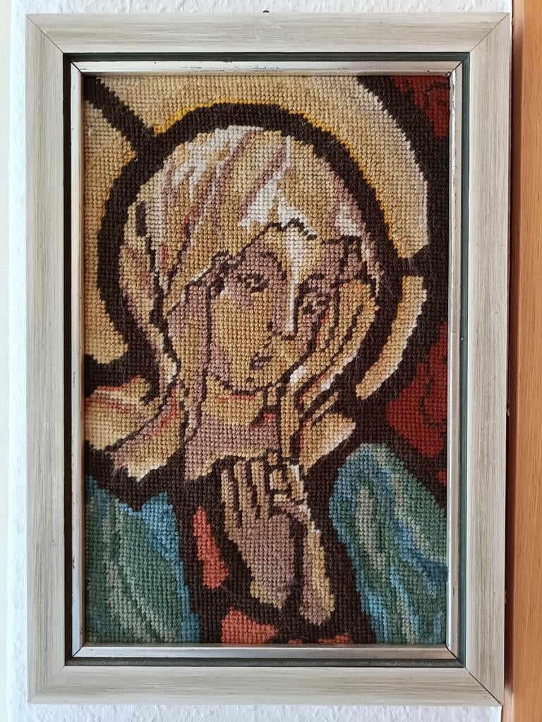 Ingelijst wandtapijt: Vrouw met aureool, Ophalen