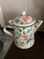 Van emaille een gebloemde pot met deksel, Ophalen