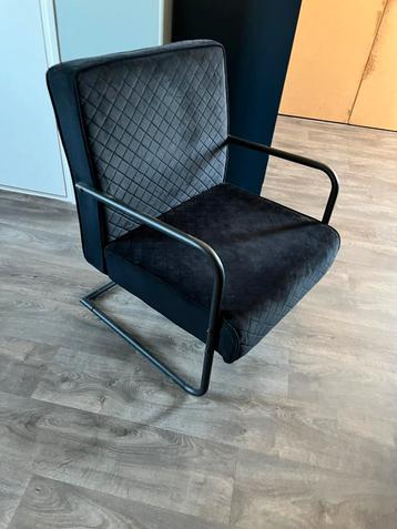 Zwarte fauteuil