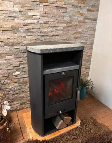 Nette vrijstaande houtkachel beschikbaar voor biedingen