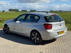 BMW 1-serie 116i Business+ 2012 Automaat Cruise control EXPO, Gebruikt, Zwart, 4 cilinders, Origineel Nederlands