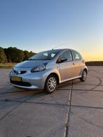 Toyota Aygo 1.0 12V Vvt-i 5DRS 2007 Grijs, Auto's, Toyota, Voorwielaandrijving, Stof, 4 stoelen, 68 pk
