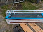 HBM professionele tegelsnijder., Doe-het-zelf en Verbouw, Gereedschap | Zaagmachines, Ophalen, Zo goed als nieuw, 1200 watt of meer