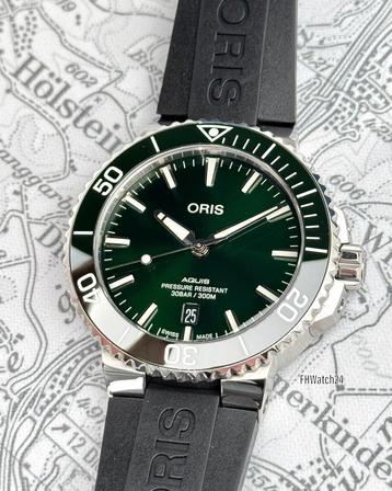 Oris Aquis Date Green 01 733 7766 4157. Full set 2024 ! beschikbaar voor biedingen