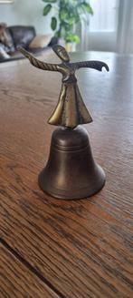 Vintage bel met een beeldje van een wervelende derwisj erop., Ophalen of Verzenden, Brons