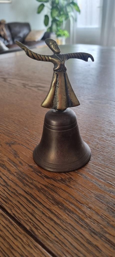 Vintage bel met een beeldje van een wervelende derwisj erop., Antiek en Kunst, Antiek | Koper en Brons, Brons, Ophalen of Verzenden