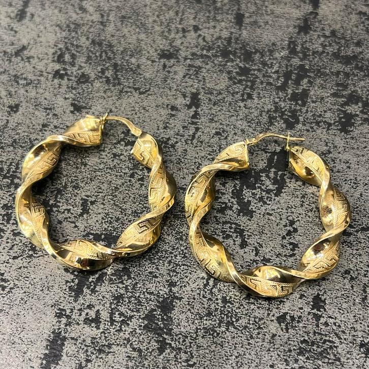 14 karaat gouden oorbellen wokkels nieuw, Sieraden, Tassen en Uiterlijk, Oorbellen, Zo goed als nieuw, Goud, Ophalen of Verzenden