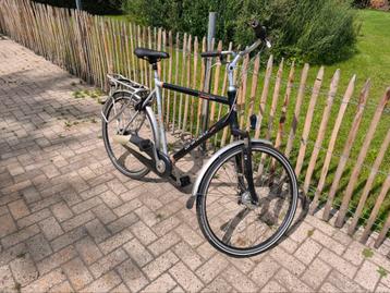 Mooie gebruikte herenfiets te koop beschikbaar voor biedingen