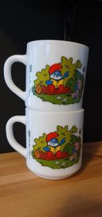 2 × Arcopal mok/beker met opdruk smurfen uit 1986 z.g.a.n., Ophalen of Verzenden, Smurfen, Zo goed als nieuw, Gebruiksvoorwerp