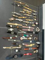 Partij met 57 horloges. Lees mij aub, Ophalen of Verzenden, Zo goed als nieuw, Staal