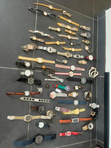 Partij met 57 horloges. Lees mij aub beschikbaar voor biedingen