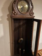 Duitse staande klok, Ophalen