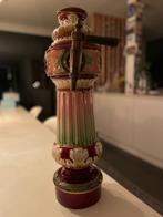 Porseleinen tapzuil, Ophalen