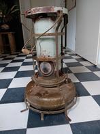 Petroleumkacheltje, Ophalen