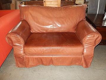 Bruin leren loveseat beschikbaar voor biedingen