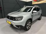 Dacia Duster 1.3 TCe 150pk Extreme (Automaat) - Navigatie -, Auto's, Dacia, Gebruikt, 4 cilinders, Bedrijf, Zilver of Grijs