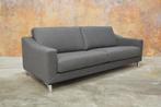 ZGAN! grijze stoffen Leolux Antonia designbank 2 beschikbaar, Huis en Inrichting, Ophalen, Leolux, Leolux, Design