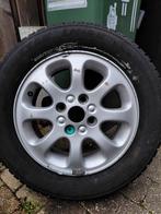 Bridgestone 205/60R15 met een profieldiepte van 7mm., Ophalen