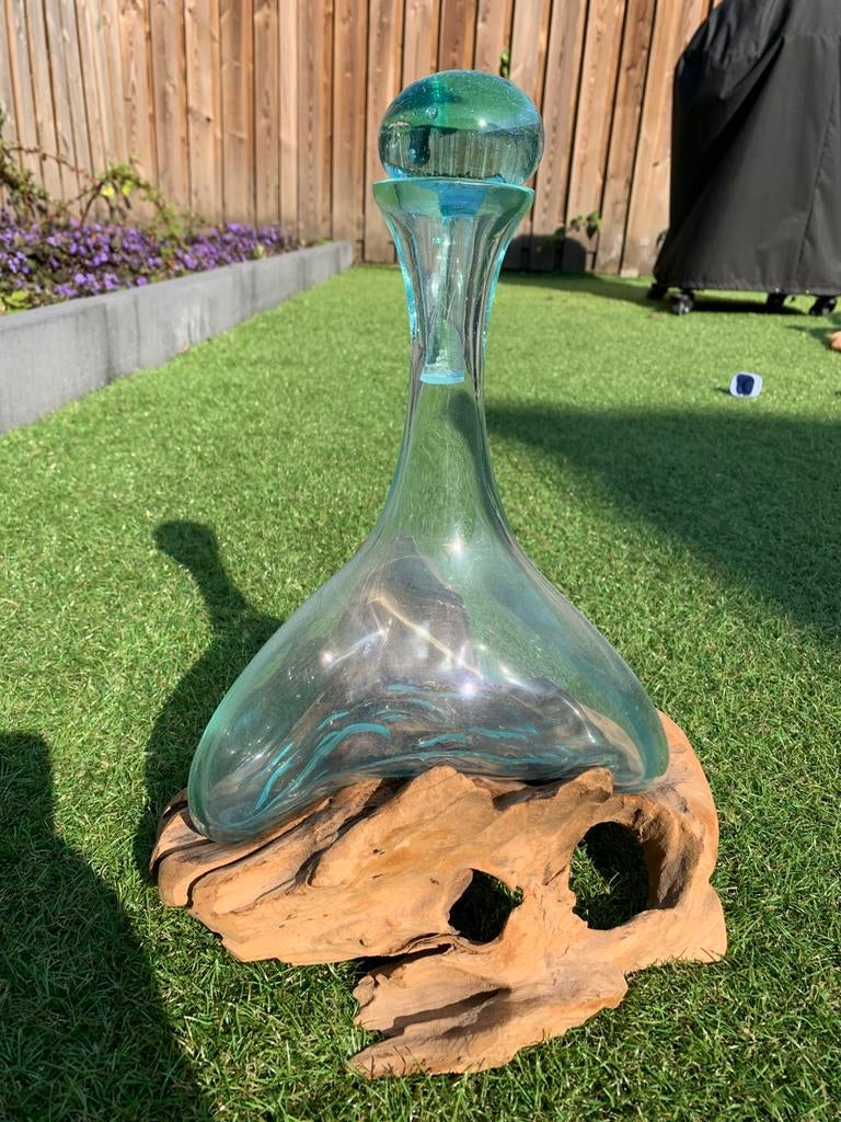 Glazen vaas op hout, Ophalen