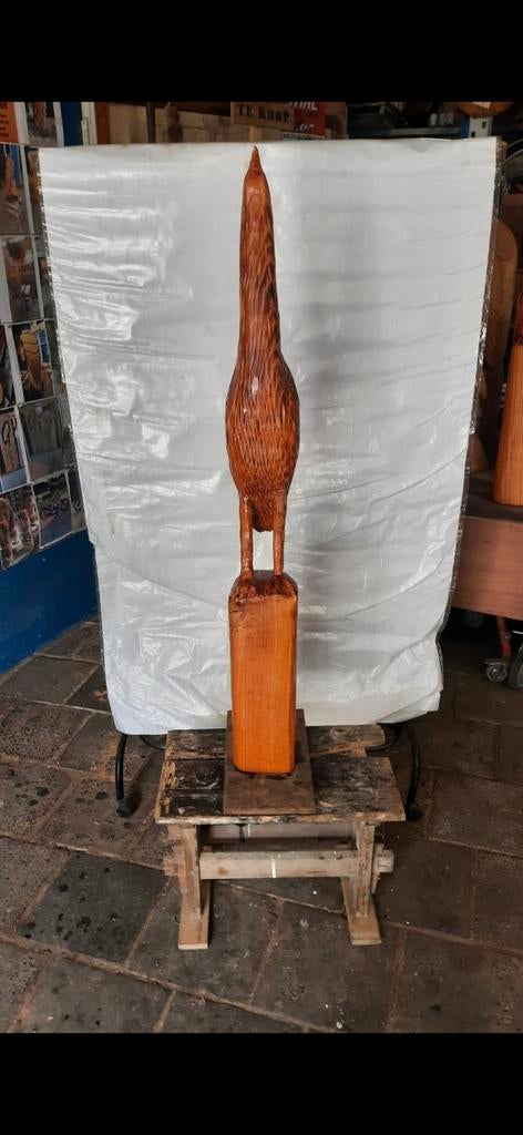 Roerdomp houtsnijwerk van Douglas hout, Ophalen