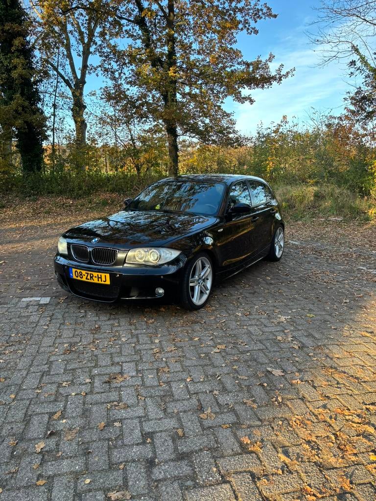 BMW 1-Serie 3.0 130I 5DR 2007 Zwart, Auto's, BMW, 1-Serie, Achterwielaandrijving, 1350 kg, 1200 kg