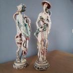 Twee Chinese beelden, man en vrouw, Ophalen
