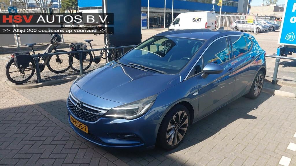 Opel Astra 1.0 Innovation cruise navi LM, Auto's, Gebruikt, Euro 6, Parkeersensor, Blauw