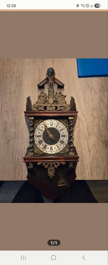 Antieke Wandklok met Gedetailleerde Versieringen, Ophalen