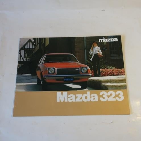 Mazda 323 1977 folder NL tekst brochure origineel, Ophalen of Verzenden, Gelezen, Mazda