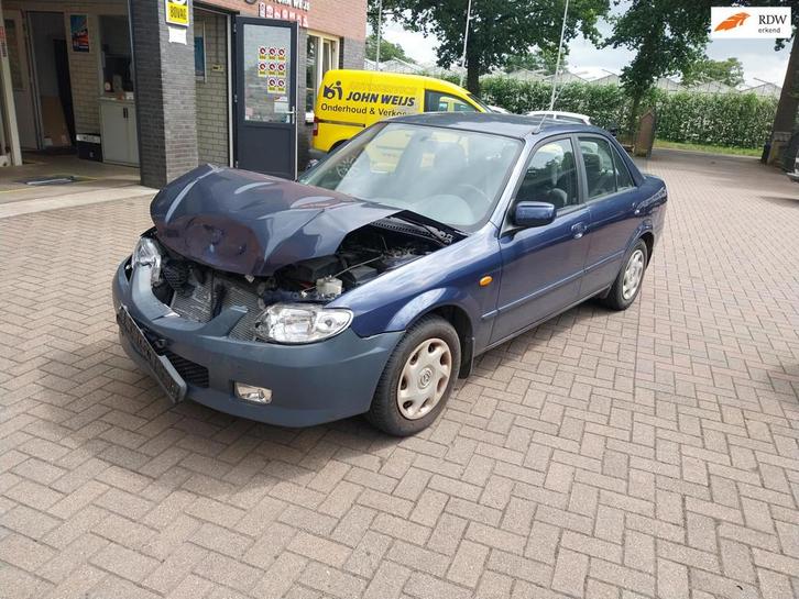 Mazda 323 1.6i airco, motor loopt goed, Auto diversen, Schadeauto's, Mazda, Handgeschakeld, Benzine, Sedan, Blauw