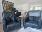 2 Robuuste zwartleren fauteuils, Ophalen, Gebruikt, 75 tot 100 cm, 50 tot 75 cm